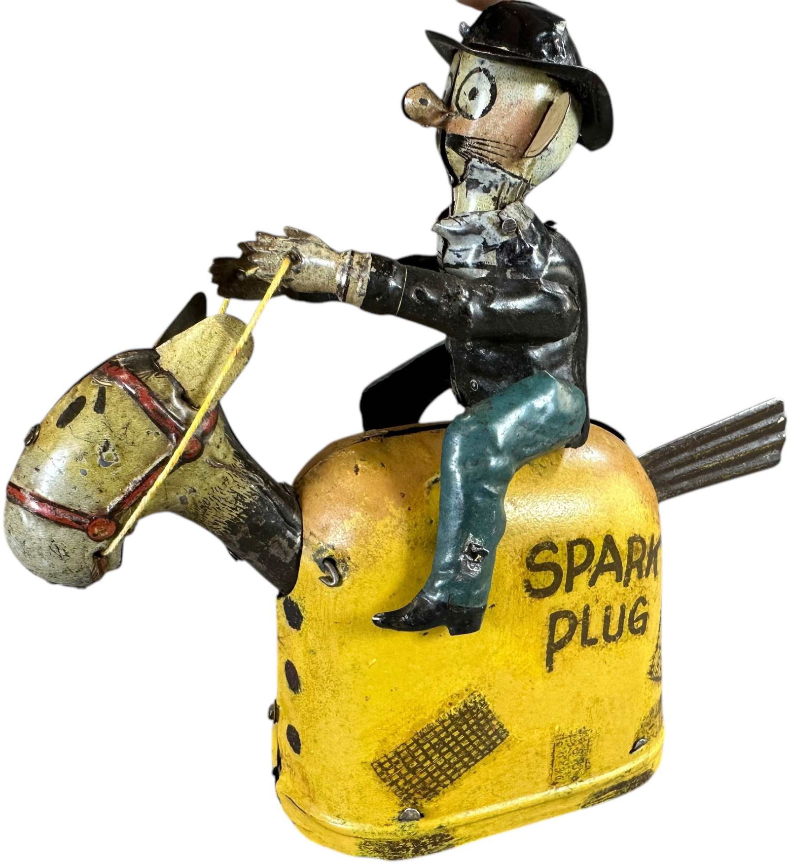 FISCHER NIFTY BARNEY GOOGLE SPARK PLUG: 266. FISCHER NIFTY BARNEY GOOGLE SPARK PLUG | Germany, wind-up motor. | 7.5" l. | One replaced ear, paint enhancement in areas, (Very Good to Excellent Condition) | $500 - $1,000