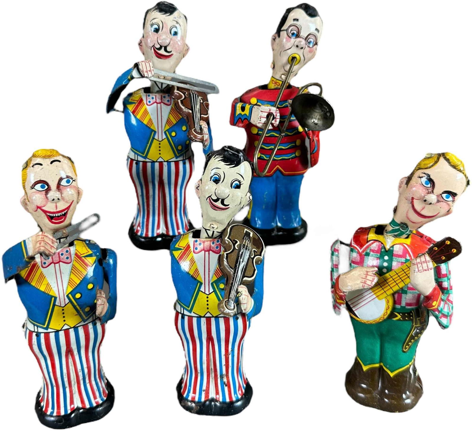 FIVE LINEMAR WIND-UP MUSICIAN FIGURES: 270. FIVE LINEMAR WIND-UP MUSICIAN FIGURES | Japan, wind-up motors. | 5" h. | Some minor factory touch-ups as is common on LineMar toys, one figure missing violin, one figure missing right arm, overal