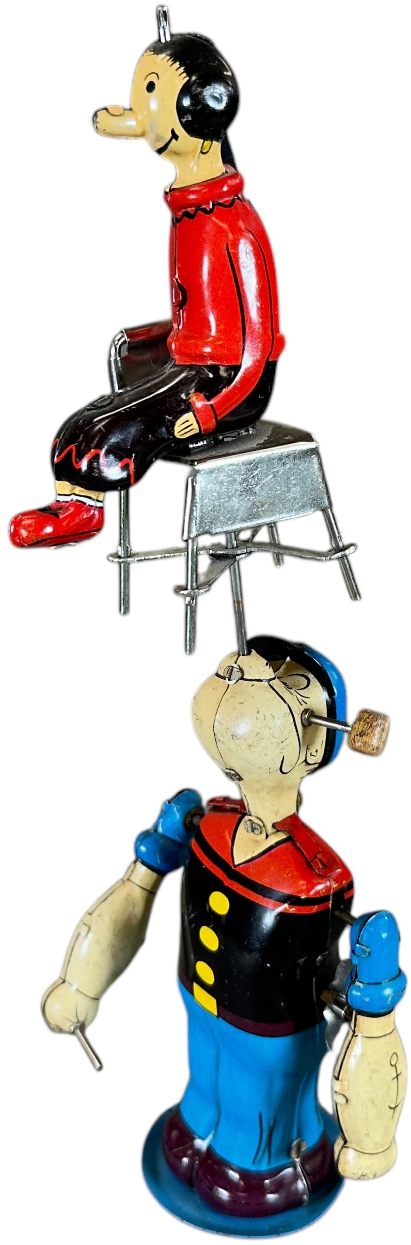LINEMAR POPEYE SPINNING OLIVE OYL: 285. LINEMAR POPEYE SPINNING OLIVE OYL | Japan, wind-up motor. | 9" h. | Typical factory touch-ups as always found on this toy, (Excellent Condition) | $800 - $1,600