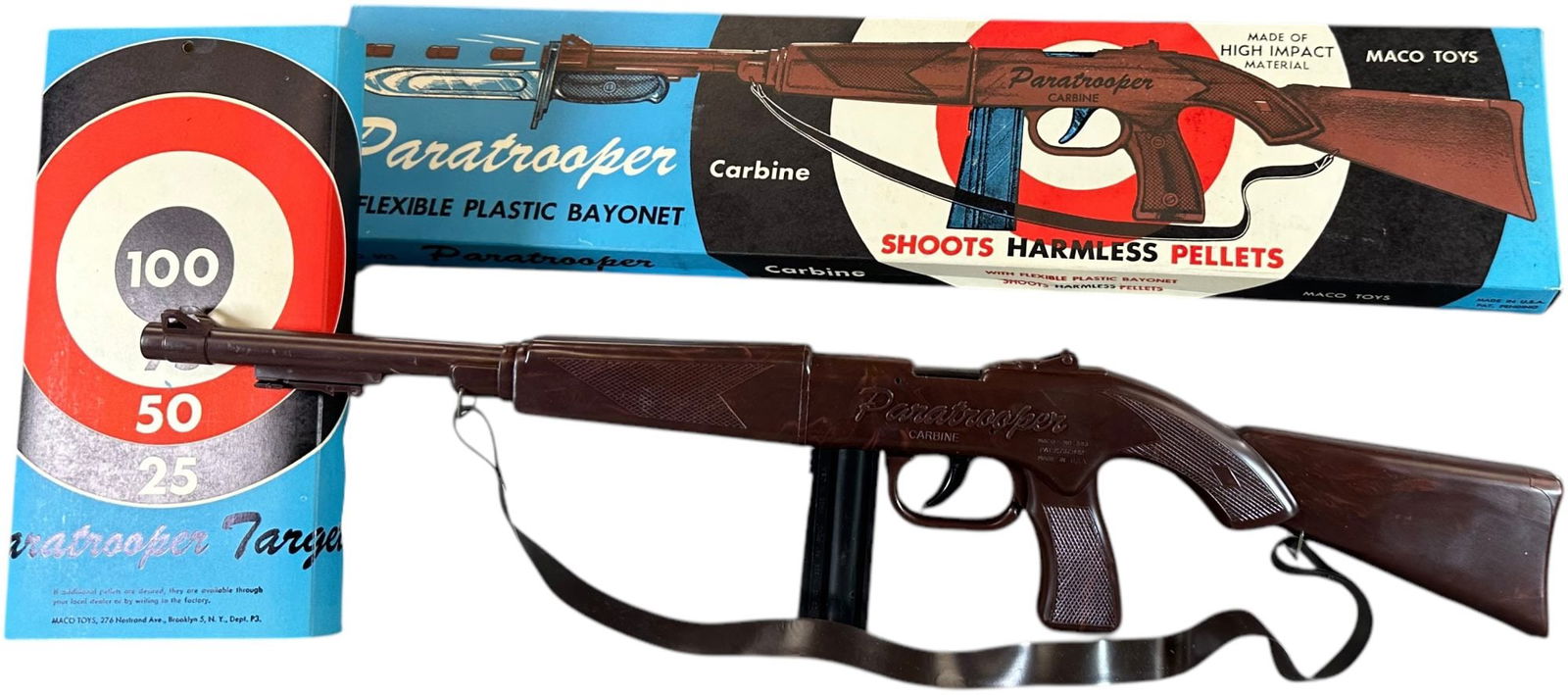 BOXED MACO TOYS PARATROOPER CARBINE CAP GUN: 404. BOXED MACO TOYS PARATROOPER CARBINE CAP GUN | With box and target. | 23" l. | Box has some minor warping, (Pristine to Near Mint Condition) | $200 - $400