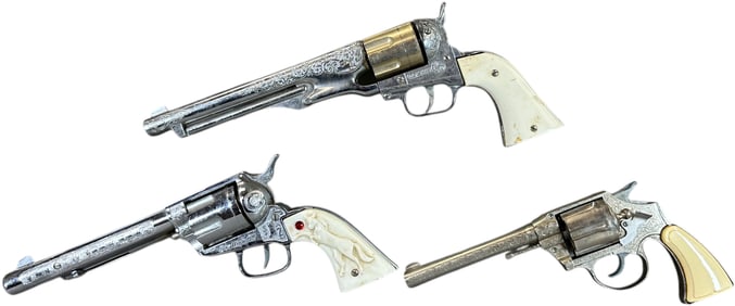 THREE CHILDRENS WESTERN CAP PISTOL GUNS