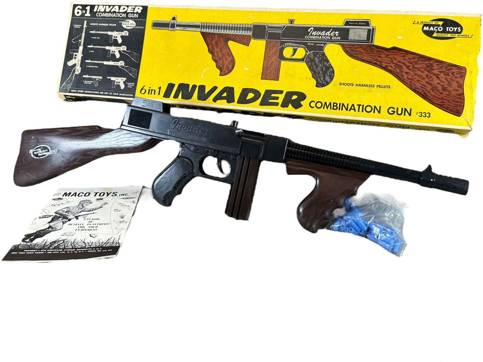 RARE MACO INVADER COMBINATION CAP GUN: 455. RARE MACO INVADER COMBINATION CAP GUN | With original box, paperwork and bag of shells. | 28" l. | Box missing some flaps with wear to ends, box (Very Good to Excellent Condition), toy (Near Mint