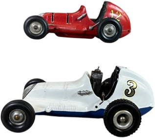 TWO THIMBLE DRONE RACERS