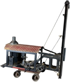 BUDDY L PILE DRIVER ON WHEELS