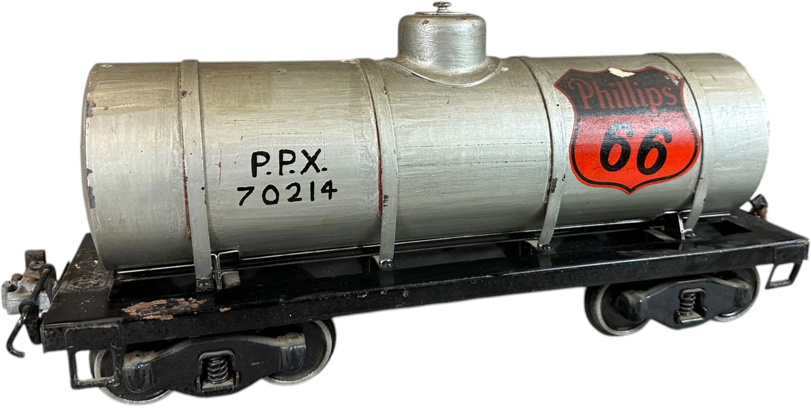 BUDDY L OUTDOOR RR TANK CAR PHILLIPS 66: 478. BUDDY L OUTDOOR RR TANK CAR PHILLIPS 66 | 17" l. | An old repaint which lights nicely under blacklight UV, (Very Good to Excellent Condition) | $250 - $500