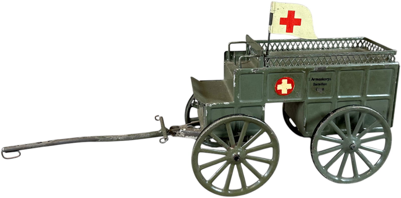 MARKLIN HORSE DRAWN FIELD AMBULANCE: 220A. MARKLIN HORSE DRAWN FIELD AMBULANCE | Germany, circa 1910, beautifully hand painted tinplate depicting a horse drawn field ambulance wagon, stenciled "Armeekorps Batallion Comp." | 12" l. | Hitc