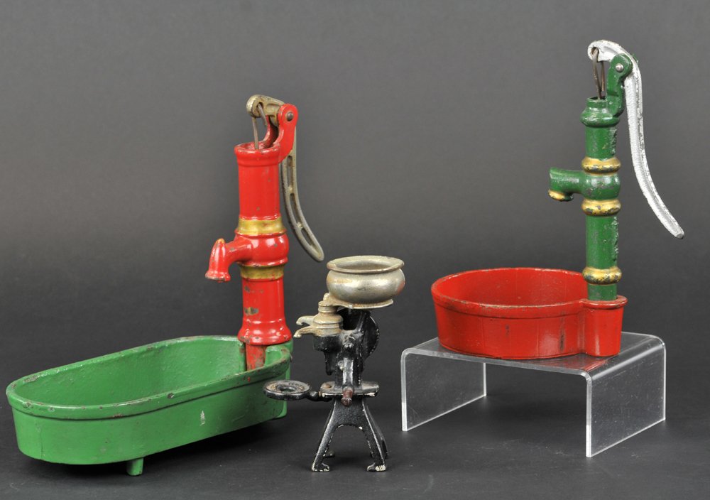 LOT OF TWO ARCADE PUMPS & GREEN MCCORMICK DEERING: 5" h. to 8 1/2" l.