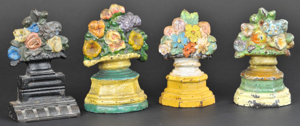 LOT OF FOUR FLOWER BASKET BOOKENDS / DOORSTOPS: 6" to 6 1/2" h.