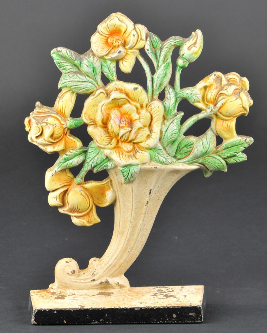 YELLOW ROSES IN SLANTED VASE DOORSTOP: 10" h.
