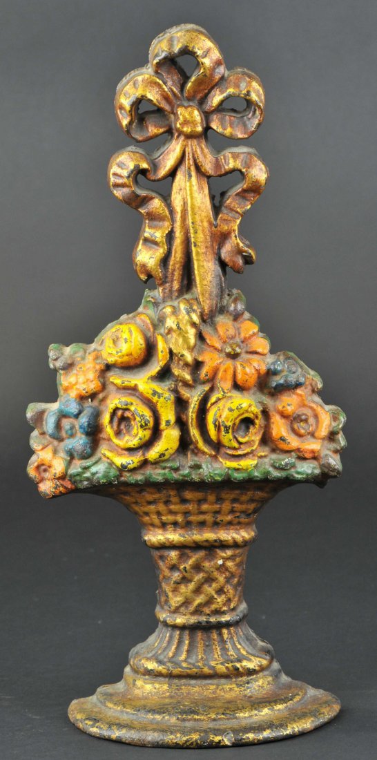 MIXED FLOWERS IN WICKER BASKET DOORSTOP: 16" h.