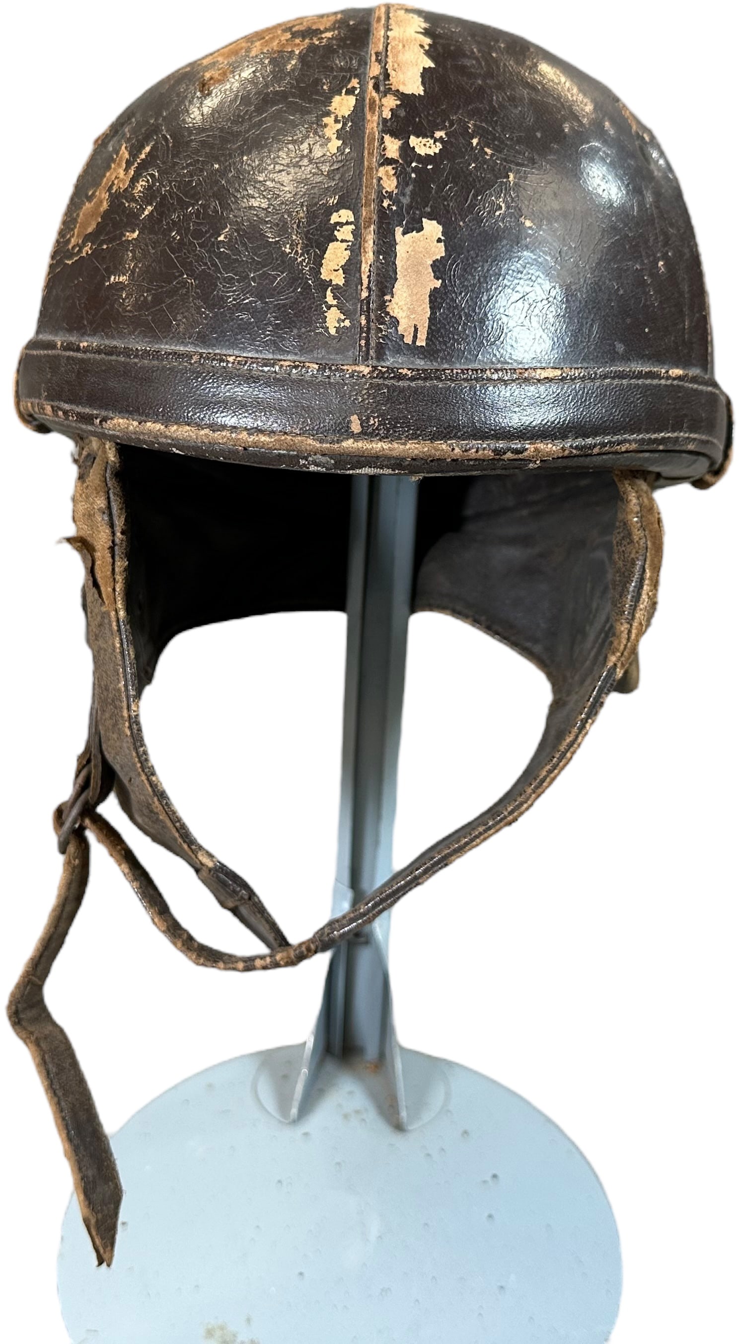 BAYARD ADULT CYCLE LEATHER HELMET: 102. BAYARD ADULT CYCLE LEATHER HELMET | From the Italian collection of Steno Tonelli. | 8" dia. | Some loss to leather, (Good Condition) | $100 - $200