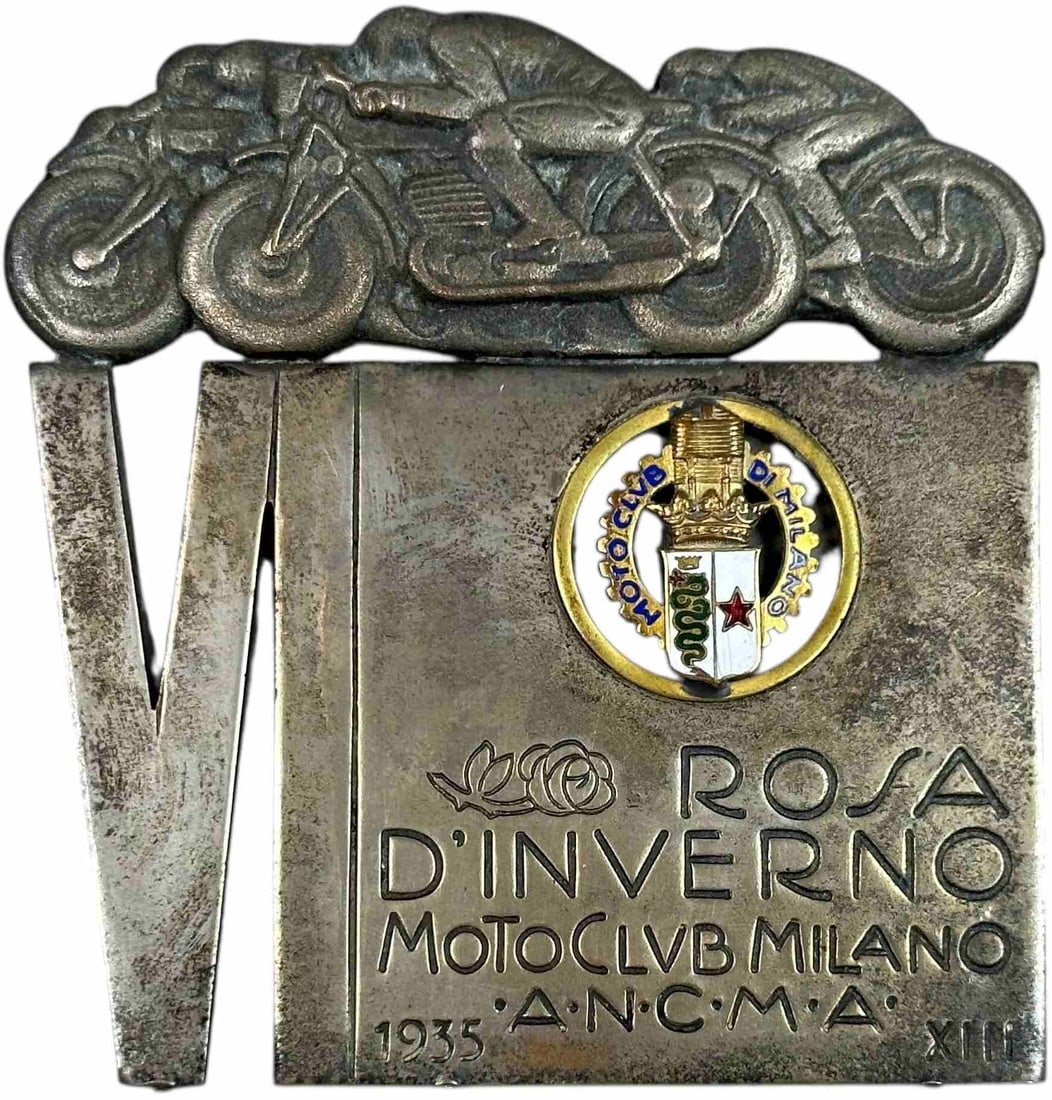 ITALIAN MOTOCLUB DI MILANO MOTORCYCLE TOKEN: 122. ITALIAN MOTOCLUB DI MILANO MOTORCYCLE TOKEN | Stamped translation "Winter Rose Motoclub Milan A.N.C.M.A 1935". From the Italian collection of Steno Tonelli. | 3.5" l. | (Very Good to Excellent Co
