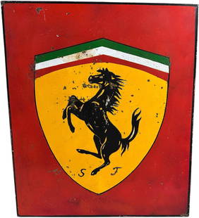 FERRARI EMBLEM TIN ADVERTISING SIGN: 128. FERRARI EMBLEM TIN ADVERTISING SIGN | Single sided tin advertising sign, expected scratches and wear from years of use. From the Italian collection of Steno Tonelli. | 16 " l. x 19" h. | Authenti