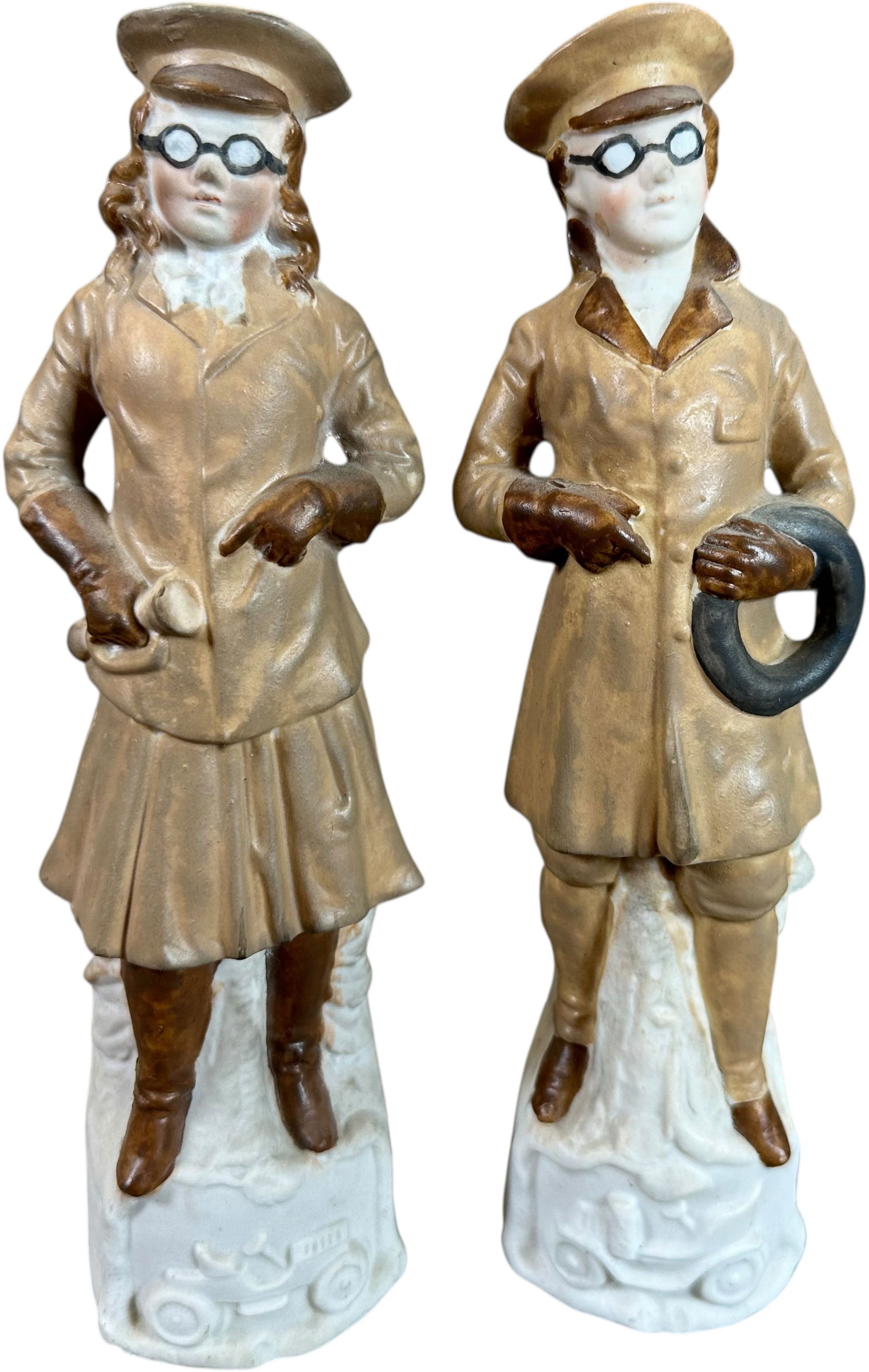 BISQUE CHAUFFER DRESSED CHILDREN FIGURINES: 161. BISQUE CHAUFFER DRESSED CHILDREN FIGURINES | From the David Bausch Automobilia collection. | 9.5" h. | (Excellent Condition) | $250 - $500