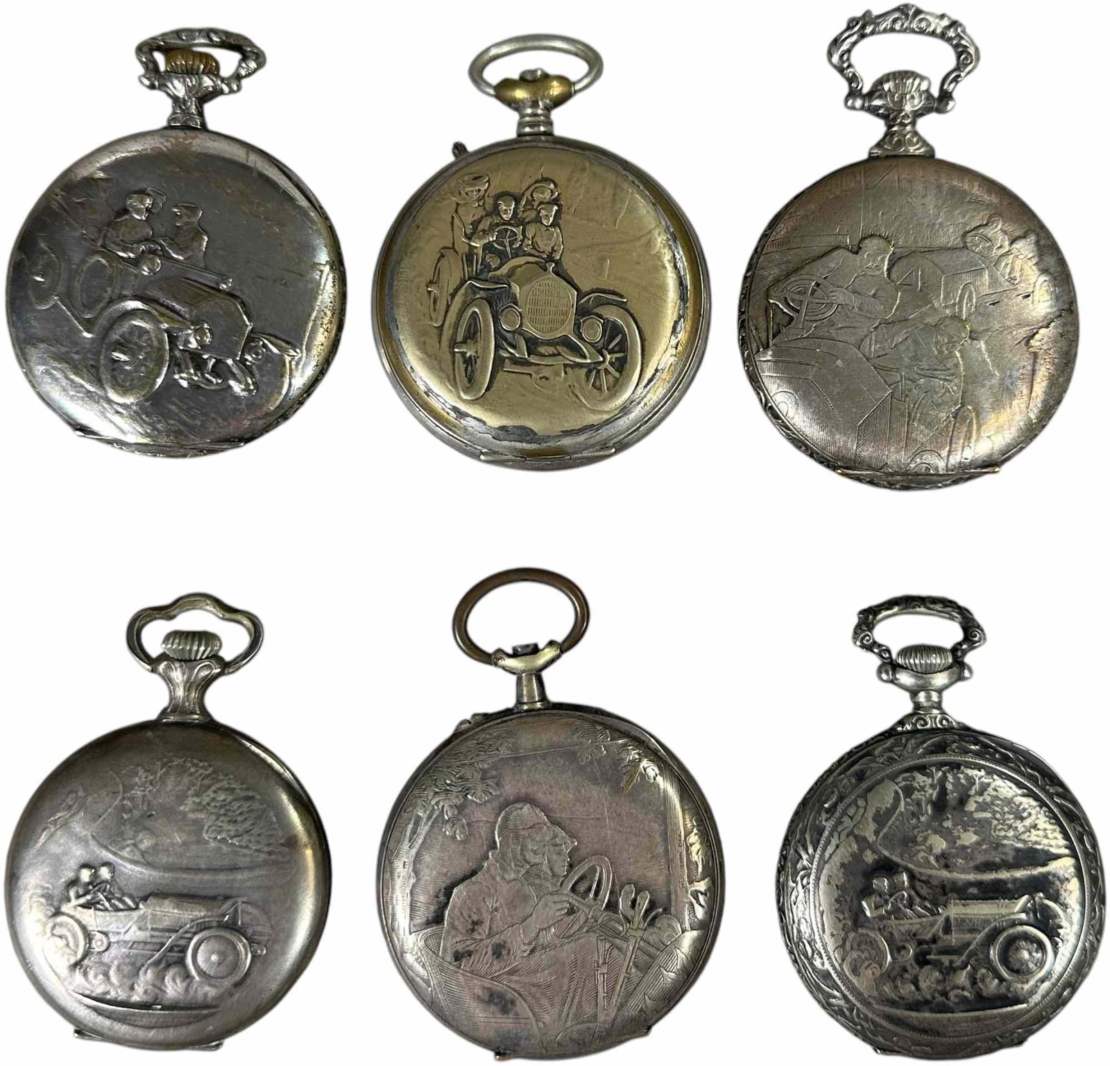 SIX AUTOMOTIVE THEME POCKET WATCHES: 251. SIX AUTOMOTIVE THEME POCKET WATCHES | One sided. From the David Bausch Automobilia collection. | 3" l. | Enigma winds but needs adjustment, two missing parts, overall ranging from (Very Good Cond