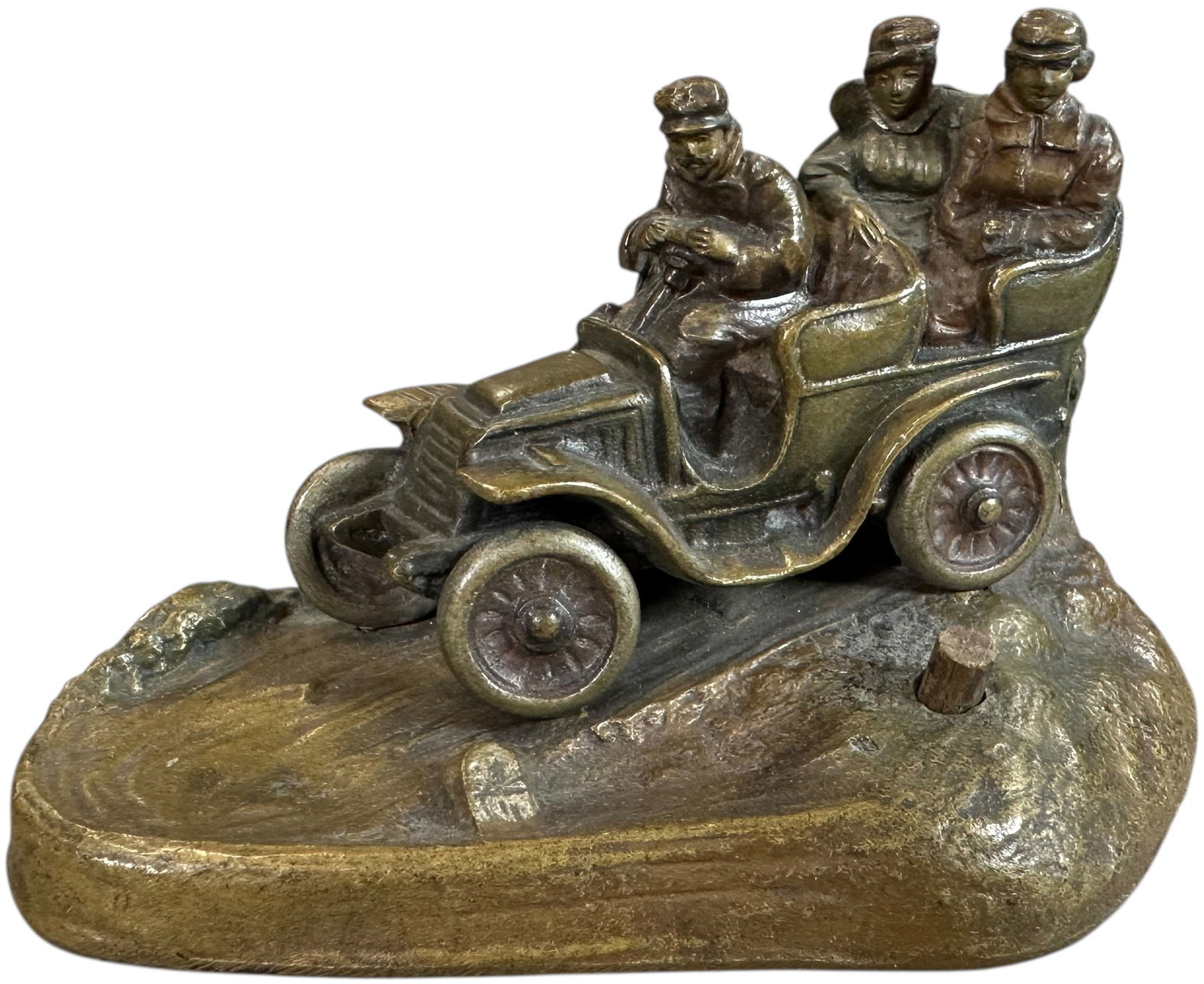 BRONZE AUTOMOTIVE THEME PAPERWEIGHT: 340. BRONZE AUTOMOTIVE THEME PAPERWEIGHT | From the David Bausch Automobilia collection. | 4" l. | Possible missing parts, (Excellent Condition) | $200 - $400