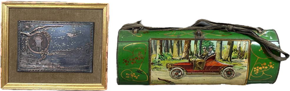 LITHOGRAPHED AUTOMOBILE LUNCHBOX W/ BRONZE PLAQUE: 343. LITHOGRAPHED AUTOMOBILE LUNCHBOX W/ BRONZE PLAQUE | Very decorative tin hinged lunchbox with lithographed automotive imagery, along with an early aviation commemorative plaque. From the David Bau