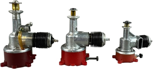 THREE OK CUB MODEL AIRPLANE ENGINES