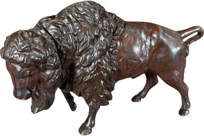 BUFFALO TWIST TAIL MECHANICAL BANK