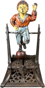 BOY ON TRAPEZE MECHANICAL BANK