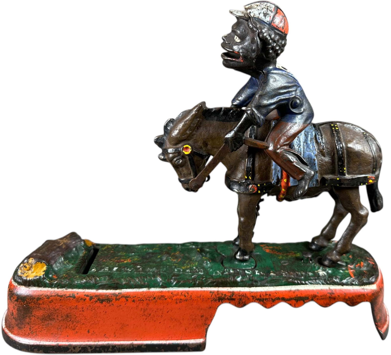 SPISE A MULE MECHANICAL BANK - JOCKEY: 201. SPISE A MULE MECHANICAL BANK - JOCKEY | J&E Stevens Co. | 9.5" l. | One side of screw head is chipped at underside of base which is insignificant and only mentioned for accuracy of this report, (