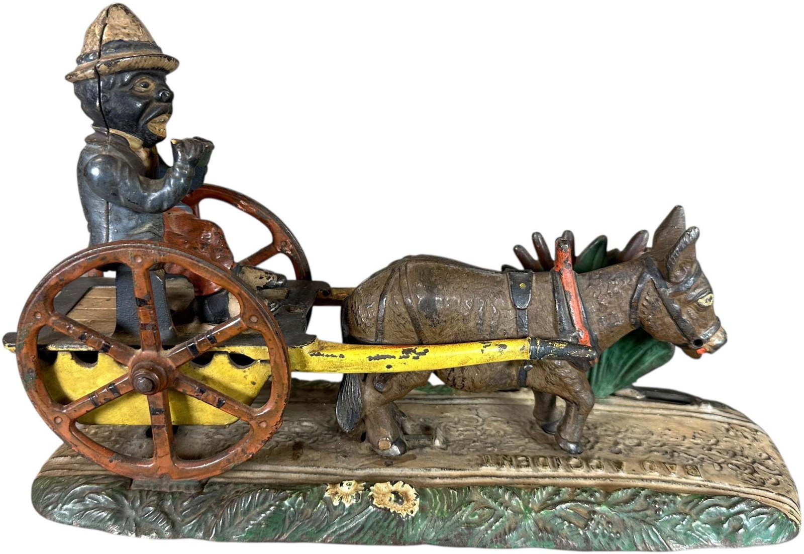BAD ACCIDENT MECHANICAL BANK: 258. BAD ACCIDENT MECHANICAL BANK | J&E Stevens Co. | 10" l. | All original with a hairline to one rear spoke of wheel, trap is absent, bank can be polished up to (Very Good to Excellent Condition) | 