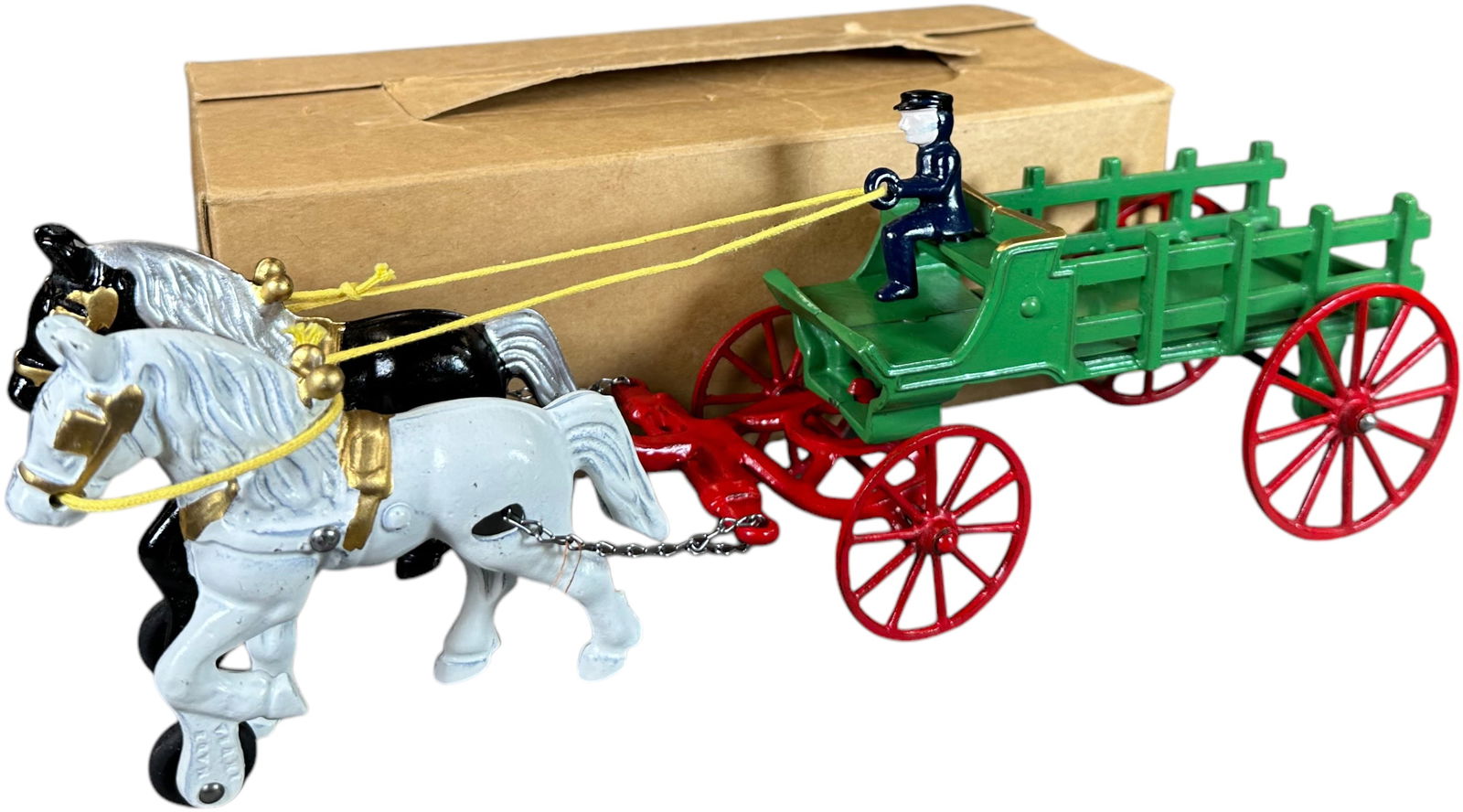 BOXED KENTON HORSE DRAWN STAKE WAGON: 305. BOXED KENTON HORSE DRAWN STAKE WAGON | 14" l. | (Near Mint Condition) | $200 - $400
