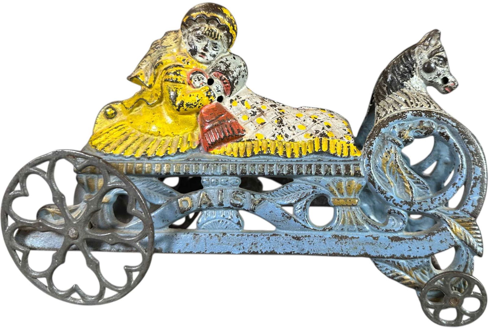 GONG BELL DAISY BELL TOY: 395. GONG BELL DAISY BELL TOY | 8" l. | (Very Good to Excellent Condition) | $250 - $500