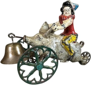 GONG BELL CLOWN ON PIG BELL TOY
