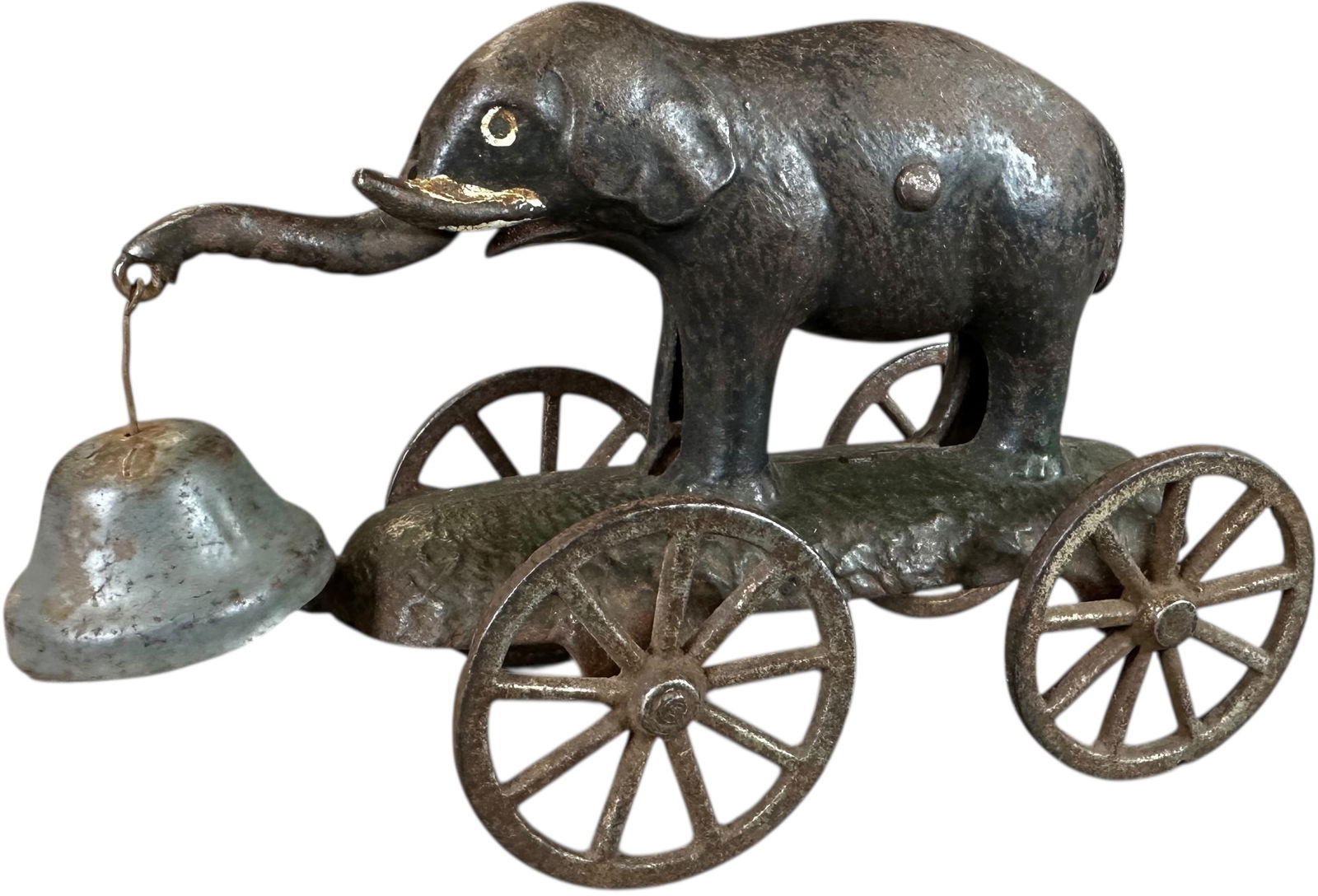 NN HILL ELEPHANT BELL TOY: 403. NN HILL ELEPHANT BELL TOY | Cast iron elephant is cast in base with articulated trunk to ring bell while rolling. | 6" l. | Paint is all original in (Very Good Condition) | $300 - $600