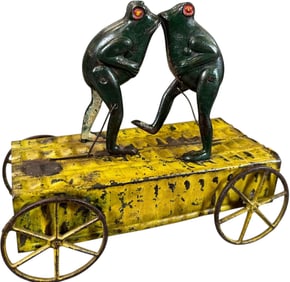 KICKING FROGS PULL TOY