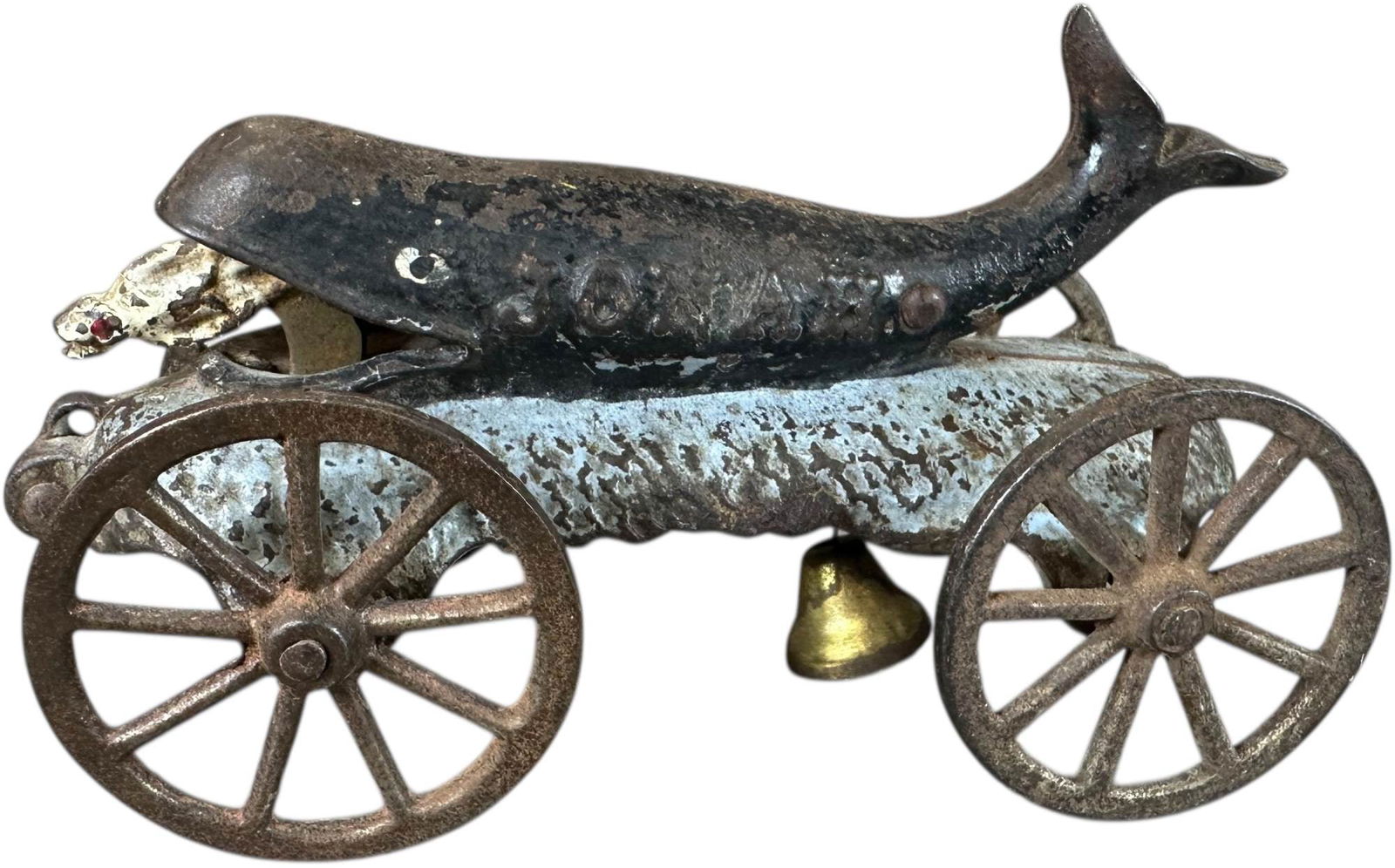 NN HILL JONAH & WHALE BELL TOY: 405. NN HILL JONAH & WHALE BELL TOY | A very popular example with wonderful theme as Jonah disappears into whales mouth and reemerges. Provenance: Richard Mueller Collection. | 6" l. | All original in