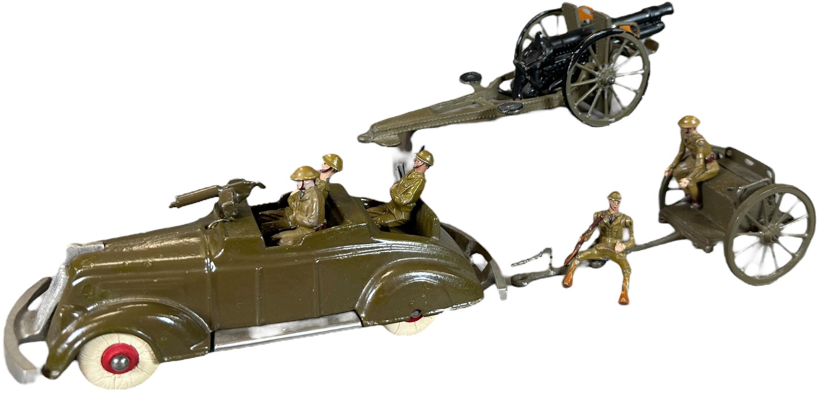 RARE WARREN LINES SOLDIER TOYS: 501. RARE WARREN LINES SOLDIER TOYS | Includes rare machine gun cast iron car and a partial horse artillery set. | 6" l. car | Missing horses, riders and three other figures, car has minor touch-ups, 