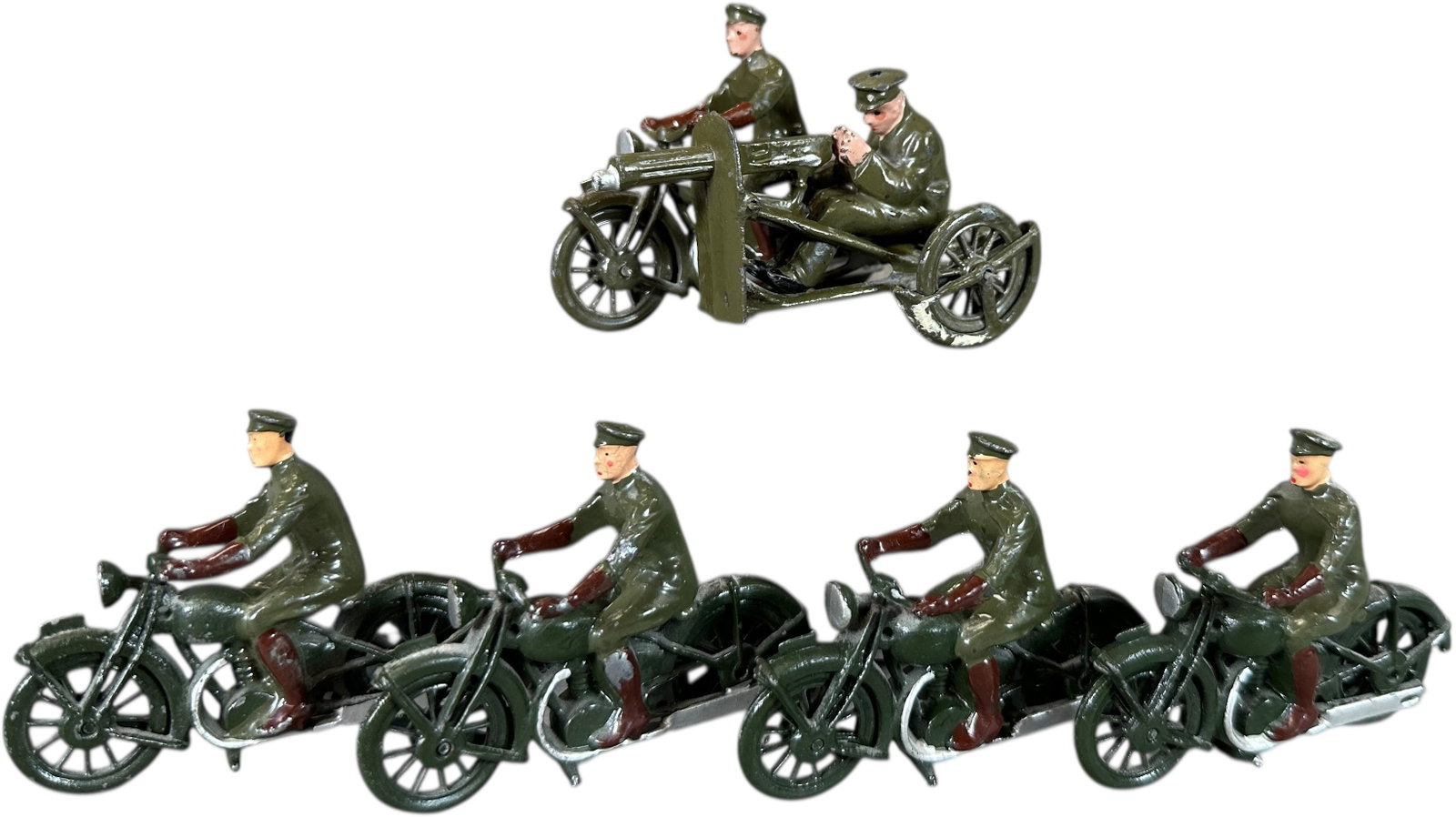FIVE ASSORTED BRITAINS MOTORCYCLES: 502. FIVE ASSORTED BRITAINS MOTORCYCLES | five motorcycles to include four dispatch riders and one machine gun side car all original no boxes. | 54mm | (Excellent Condition) | $100 - $200