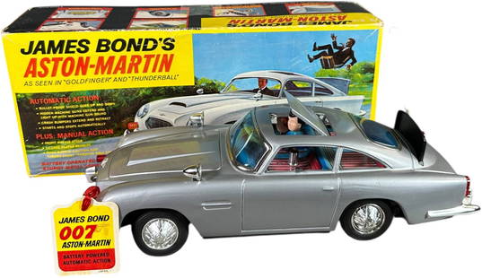 BOXED ASC JAMES BOND ASTON MARTIN: 2. BOXED ASC JAMES BOND ASTON MARTIN | 10.5" l. | Minor wear at box edges, toy with only one mirror re-glued to body, (Pristine to Near Mint Condition) | $400 - $800
