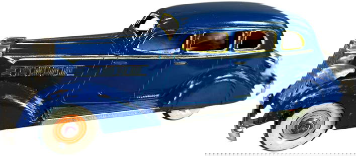 TN NOMURA 1936 PACKARD DELUXE: 9. TN NOMURA 1936 PACKARD DELUXE | Wind-up motor is working. Ex: Ira Bernstein Collection. | 8.5" l. | Some typical factory touch-ups to curved edges, nice authentic example in (Excellent 