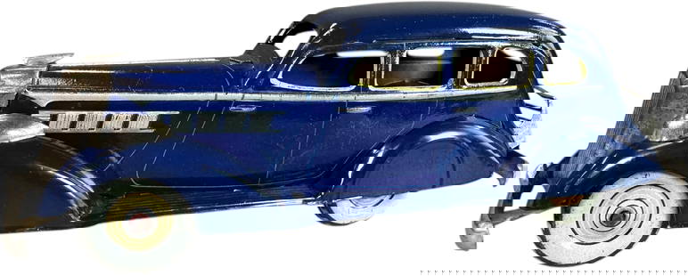 TN NOMURA 1936 PACKARD SEDAN: 11. TN NOMURA 1936 PACKARD SEDAN | Wind-up motor is working. Ex: Ira Bernstein Collection. | 8.5" l. | Very miniscule darkening to scratches along curved edges, displays in (Excellent to Pristine