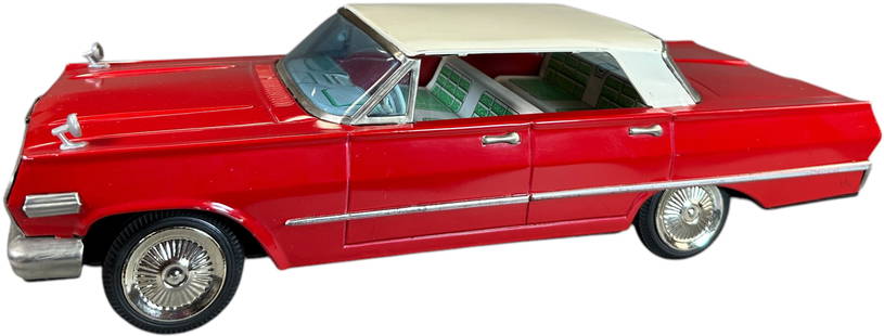 NOMURA 1963 CHEVROLET IMPALA: 13. NOMURA 1963 CHEVROLET IMPALA | Japan, friction driven. | 17.5" l. | Very little signs of use, rear windshield shows slight bending, (Near Mint Condition) | $250 - $500