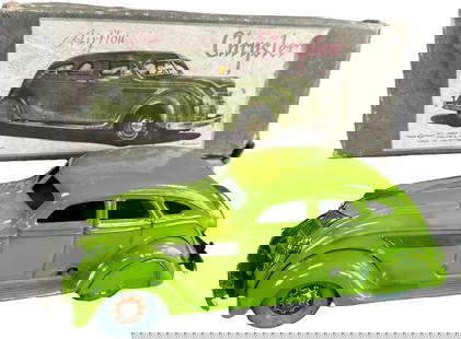 BOXED CK KOSUGE 1935 CHRYSLER AIRFLOW: 19. BOXED CK KOSUGE 1935 CHRYSLER AIRFLOW | Ex: Ira Bernstein Collection. | 10" l. | Some seam tears to complete box with great graphic label, well blended paint enhancement to green at roof and