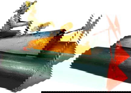 BING PONTOON BOAT: 24. BING PONTOON BOAT | Germany, circa 1927, scarce and interesting design, hand painted pontoons with seated lithographed figure, wind-up driven front blade. From the Tony Cuff collection. | 7"