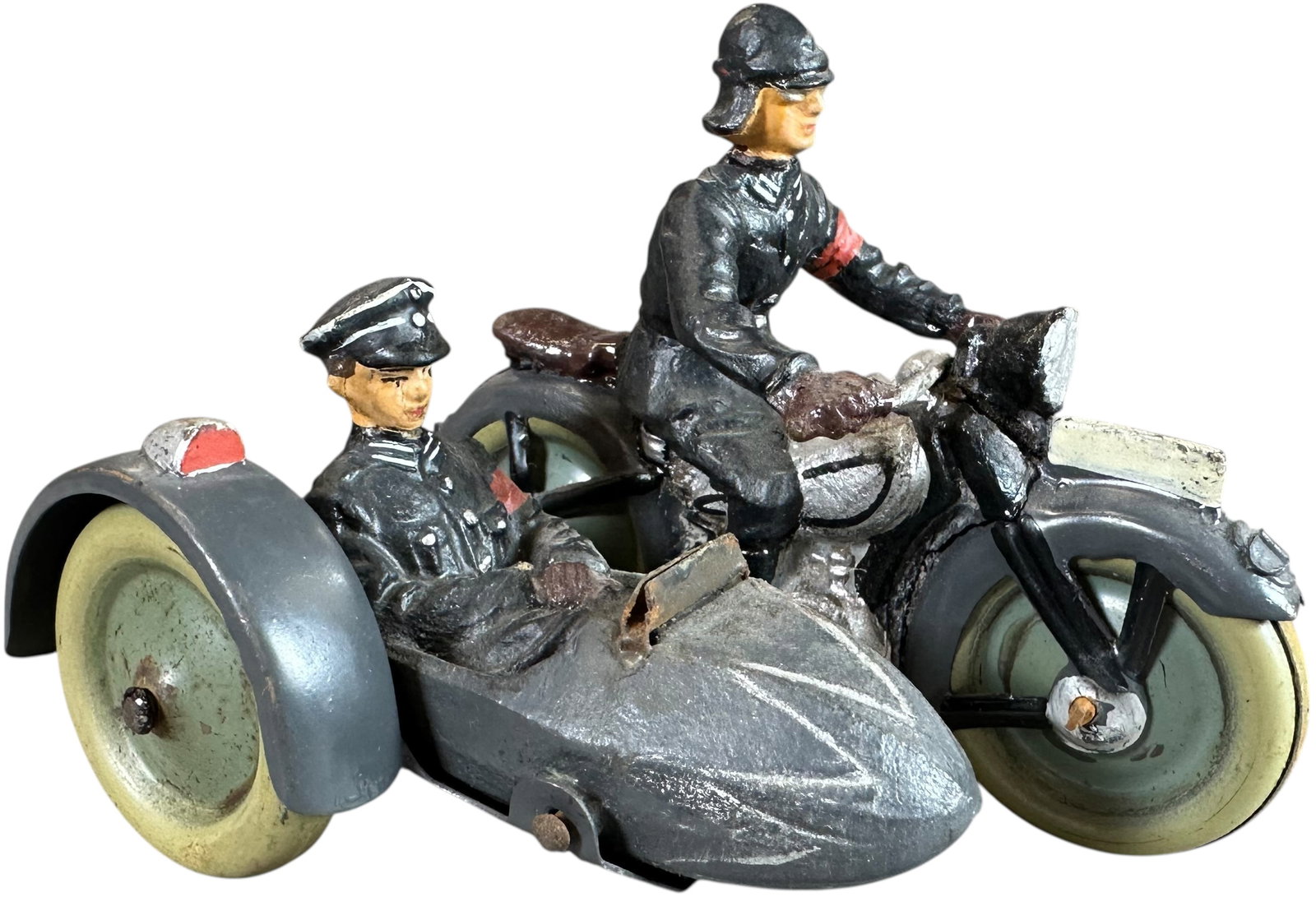 LINEOL SS SIDECAR MOTORCYCLE: 215. LINEOL SS SIDECAR MOTORCYCLE | Composition motorcycle with tin wheels soldiers have SS uniforms. From the Italian collection of Steno Tonelli. CULTURAL DISCLAIMER: Items related to World War II, 