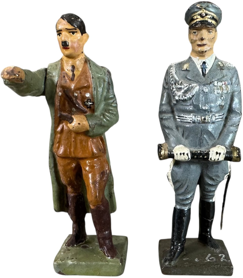 LINEOL THIRD REICH FIGURES: 261. LINEOL THIRD REICH FIGURES | Lineol Goering and Hitler in party uniform and overcoat with moveable arm. From the Italian collection of Steno Tonelli. CULTURAL DISCLAIMER: Items related to World W