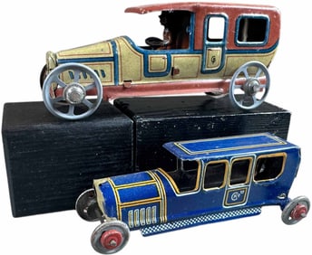 TWO LIMOUSINE PENNY TOYS