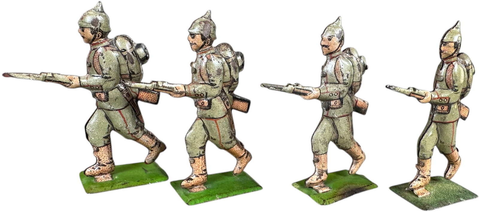 FISCHER SOLDIERS AT ARMS PENNY TOY FIGURES: 385. FISCHER SOLDIERS AT ARMS PENNY TOY FIGURES | Germany, lithographed tinplate. | 2" h. | (Excellent to Pristine Condition) | $100 - $200