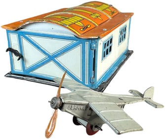 GERMAN AIRPLANE AT HANGAR PENNY TOY