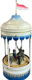 SMALL WIND-UP GERMAN TIN CAROUSEL