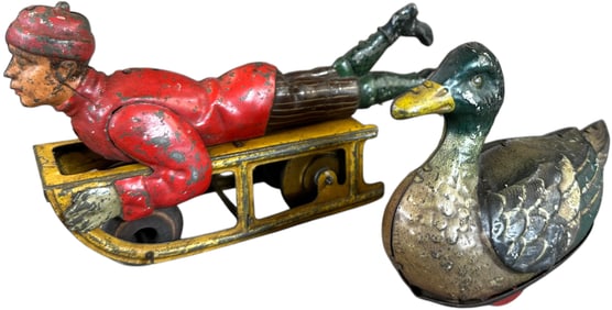 HESS DUCK & BOY ON KISMET SLED
