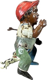 MANGOLD DOG CHASING BLACK BOY TOY