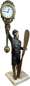 EARLY AVIATOR FIGURE CLOCK ON MARBLE BASE