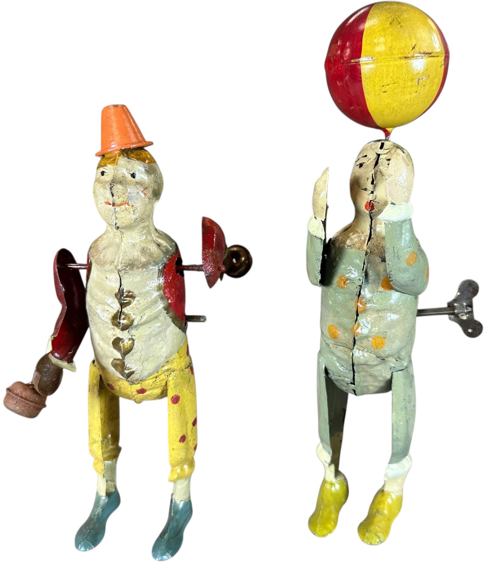 TWO GUNTHERMANN CLOWN JUGGLERS: 503. TWO GUNTHERMANN CLOWN JUGGLERS | From the Italian collection of Steno Tonelli. | 8" h. | The ball is possibly replaced, both clowns have paint enhancement in areas where was flaked, they make a s